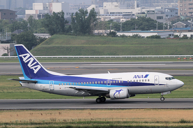 登録記号（レジ） JA302K 飛行機写真